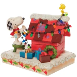 Enesco Jim Shore Peanuts Snoopy With Woodstock Decorating Dog House, 4.8"